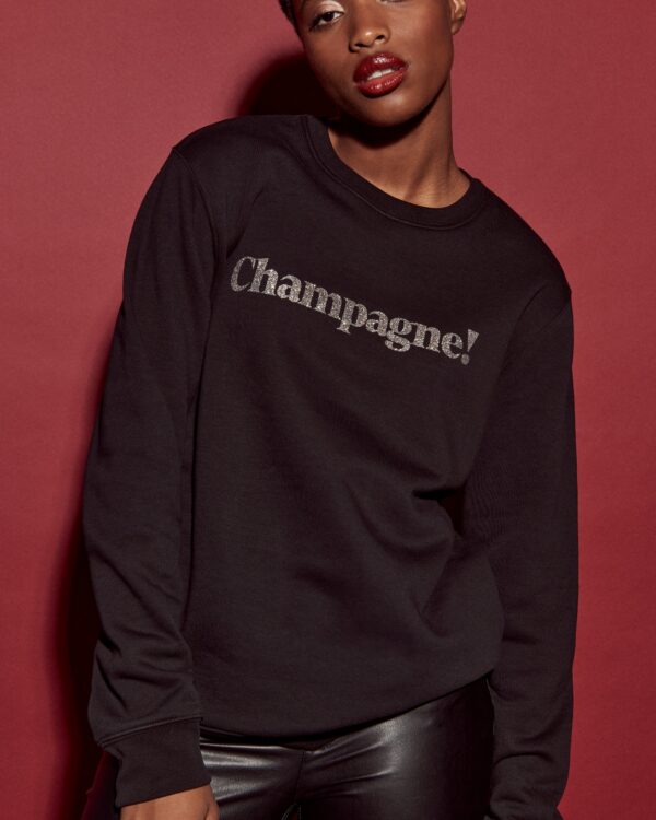 Champagne. Pullover schwarz / Glitzer